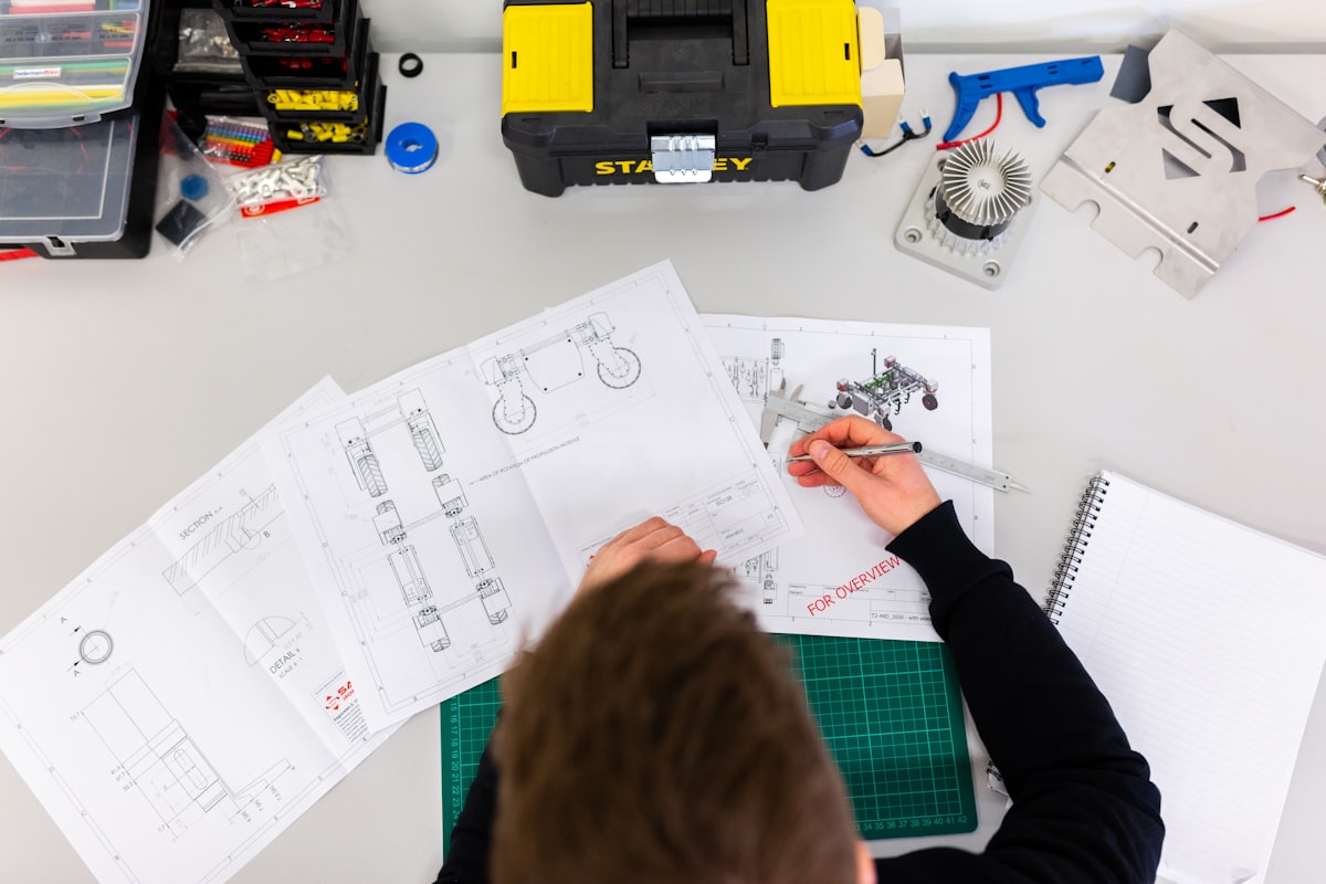 Engineers reviewing electronics research and development work